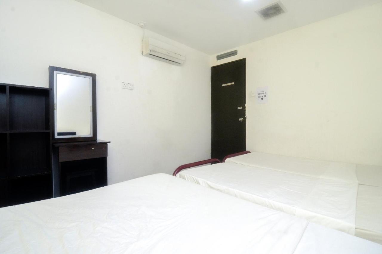 Spot On 89886 Backpacker'S Stay Services Kuching Exterior foto