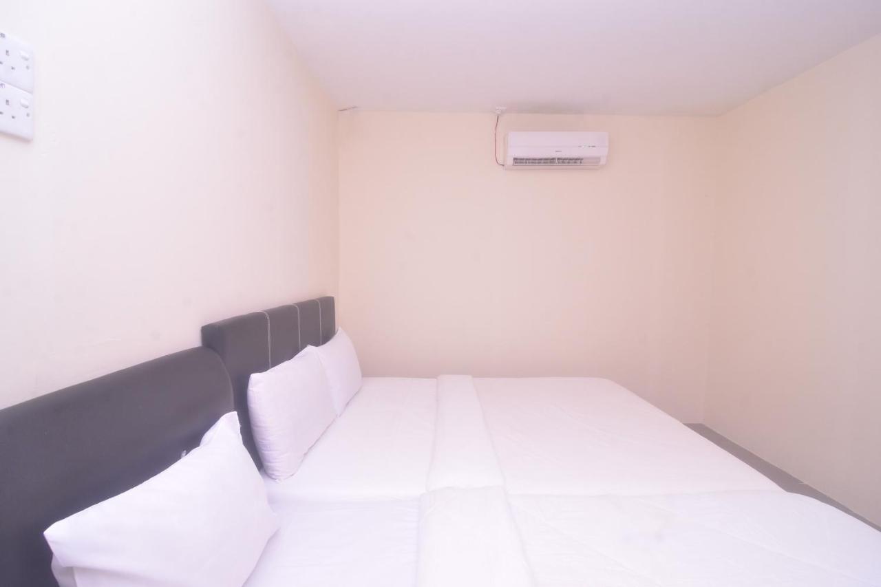 Spot On 89886 Backpacker'S Stay Services Kuching Exterior foto