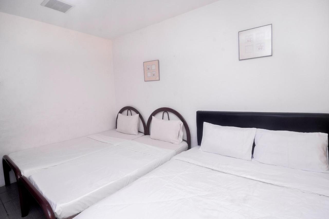 Spot On 89886 Backpacker'S Stay Services Kuching Exterior foto